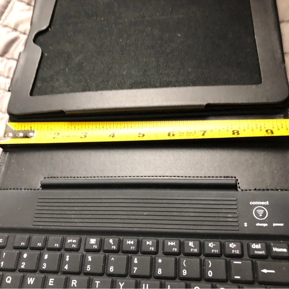 BROOKSTONE IPad cover, keyboard and stand. Black Leather